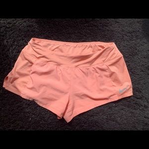 Woman’s Nike crew running shorts